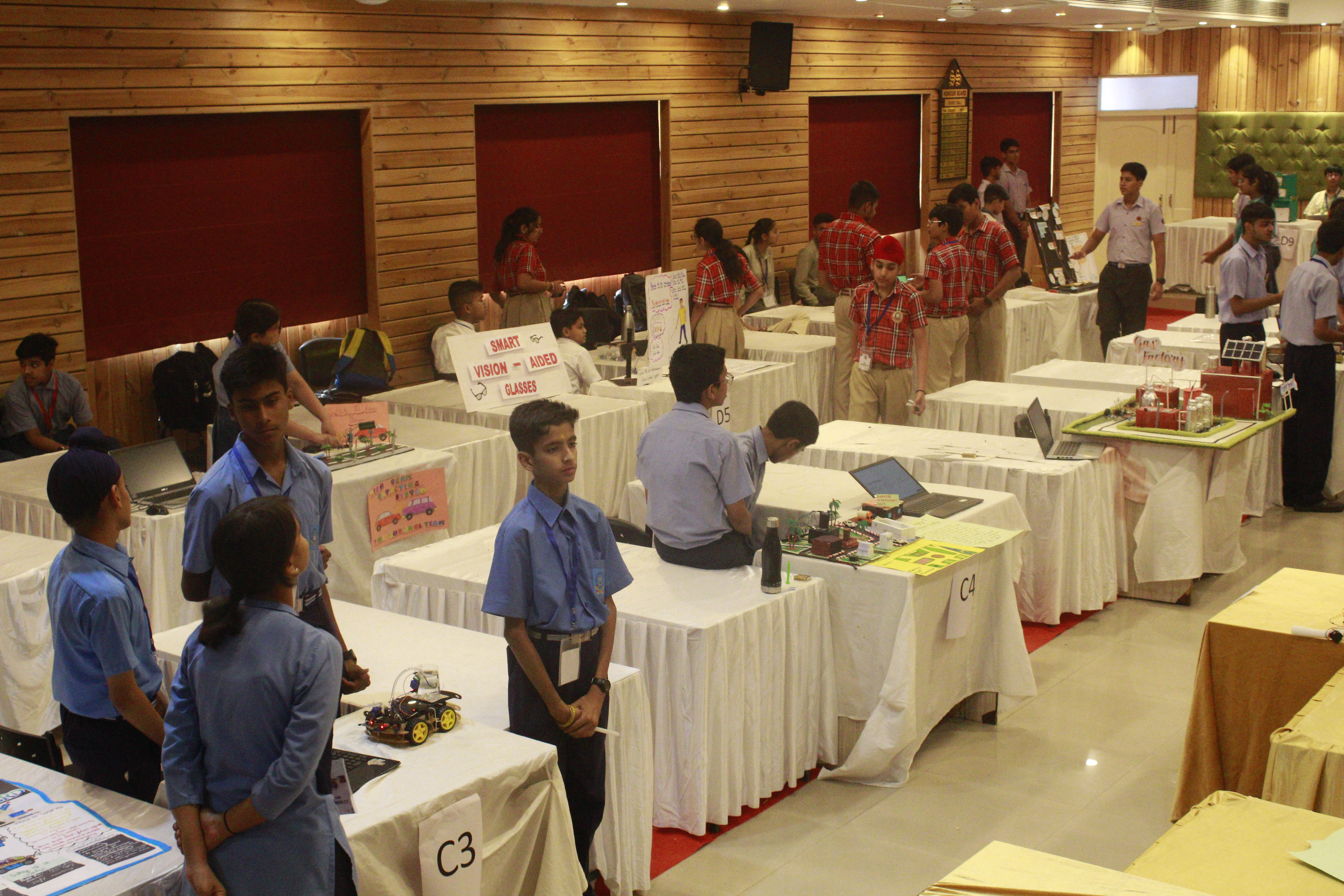 Audience visiting project exhibits during walkthrough